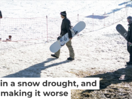 Skiers and snowboarders walk across dry ground to reach a slope at Bear Mountain ski resort on Dec. 21, 2025, in California. Eric Thayer/Los Angeles Times via Getty Images